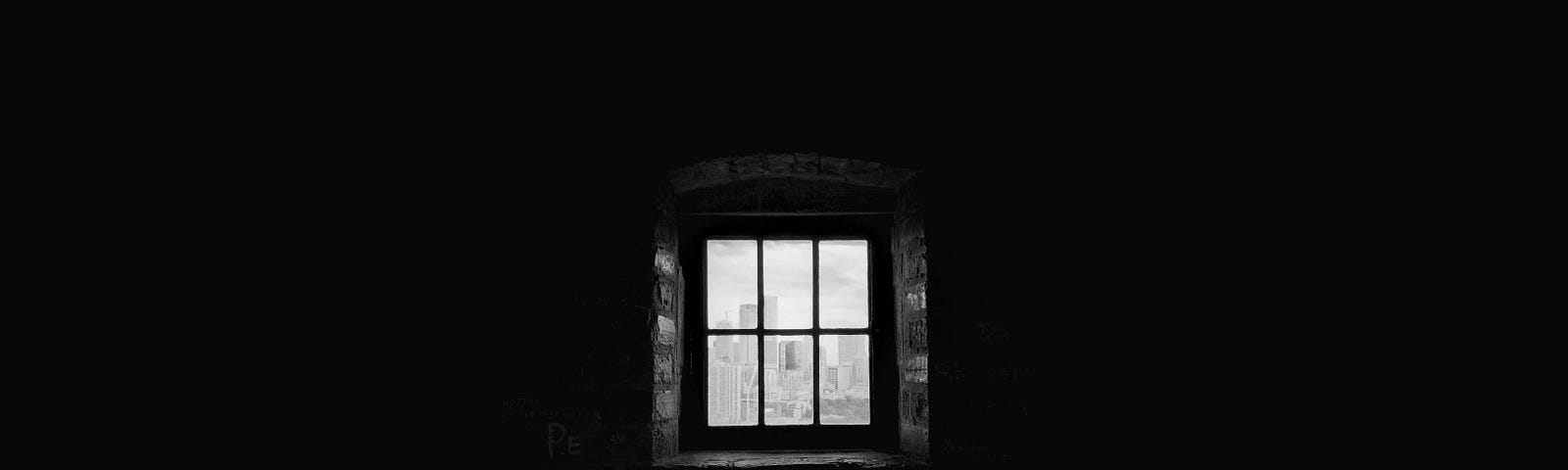 A small six pane window is set within the side of a bricked wall. The room is only partially illuminated within the area of the viewer’s point of view, with the light source being the faint day light outside. This image is used to illuminate the point of this poem’s theme.