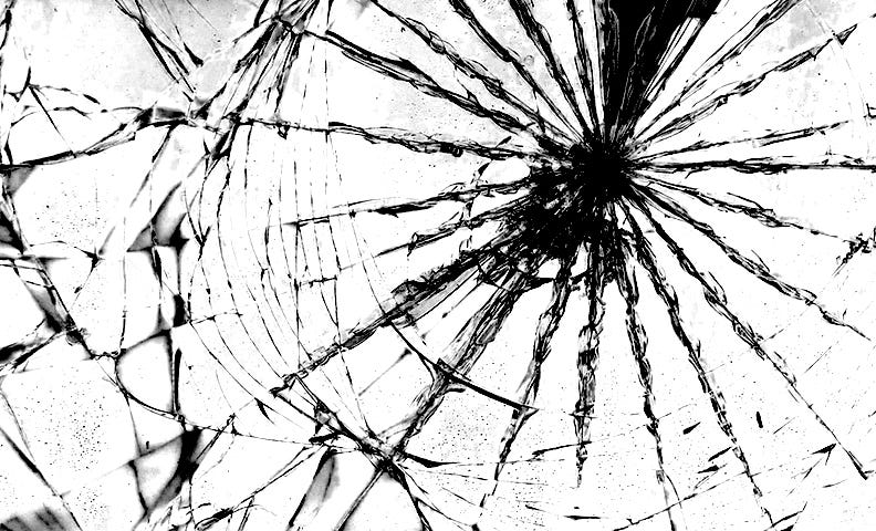 Photo illustration of a shattered window in Black and White