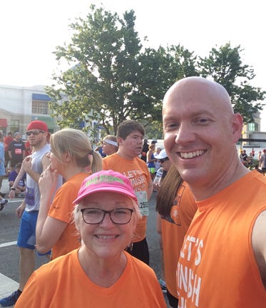 My son and I, ready to race in the Atlanta Peachtree Road Race — photo courtesy of author Marsha Hamby Savage