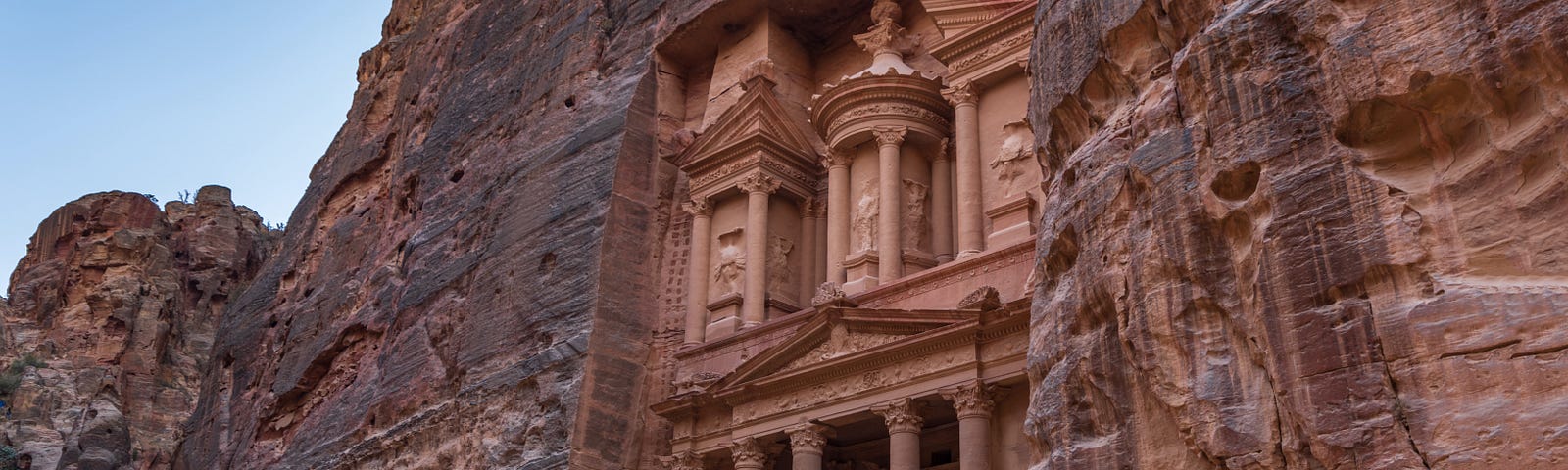 Horse and carts in front of Al Khazneh temple at Petra in Jordan