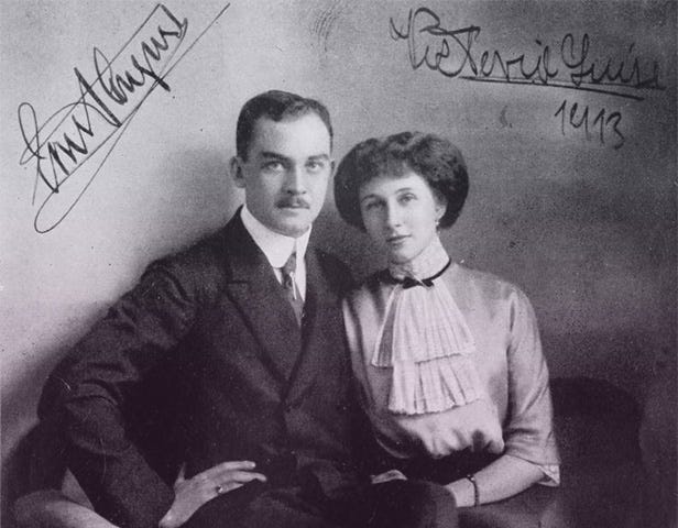 Ernst August in a dark suit and Viktoria Luise in a white blouse with layered cravat.