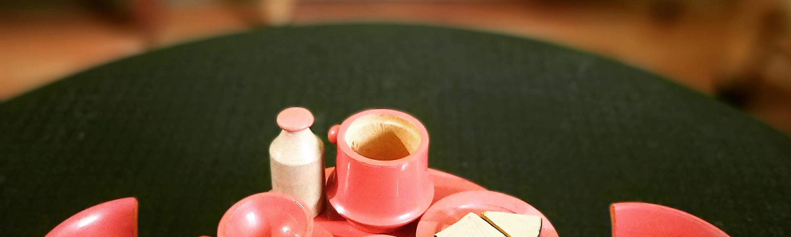 Miniature wooden tea set with table and chairs