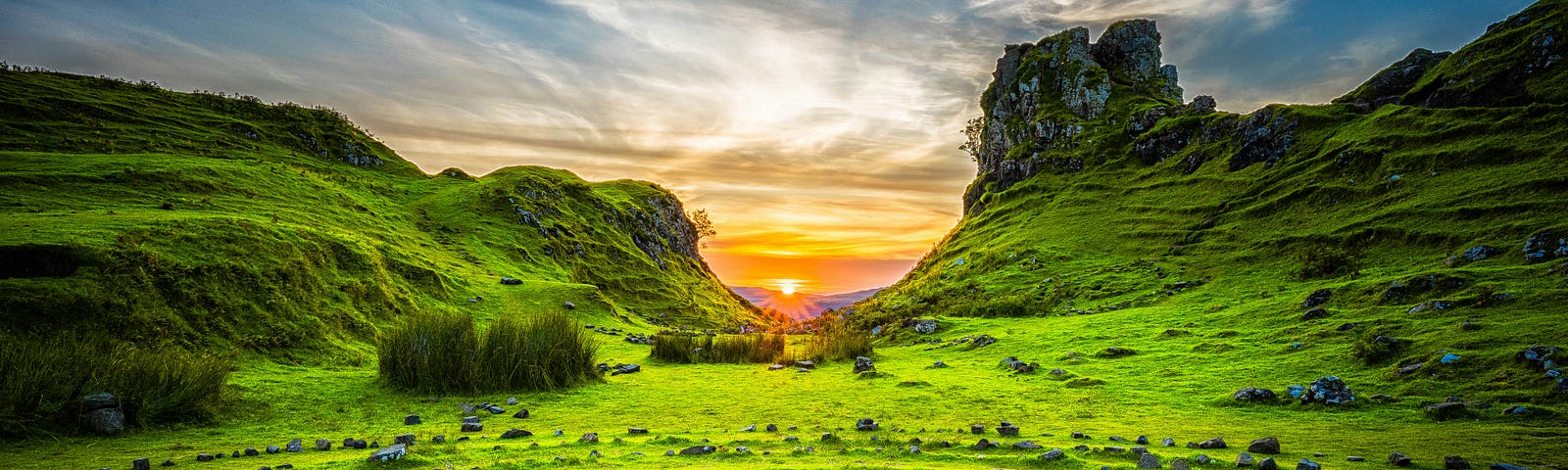 Scotland green field at sunset with a natural labyrinth.