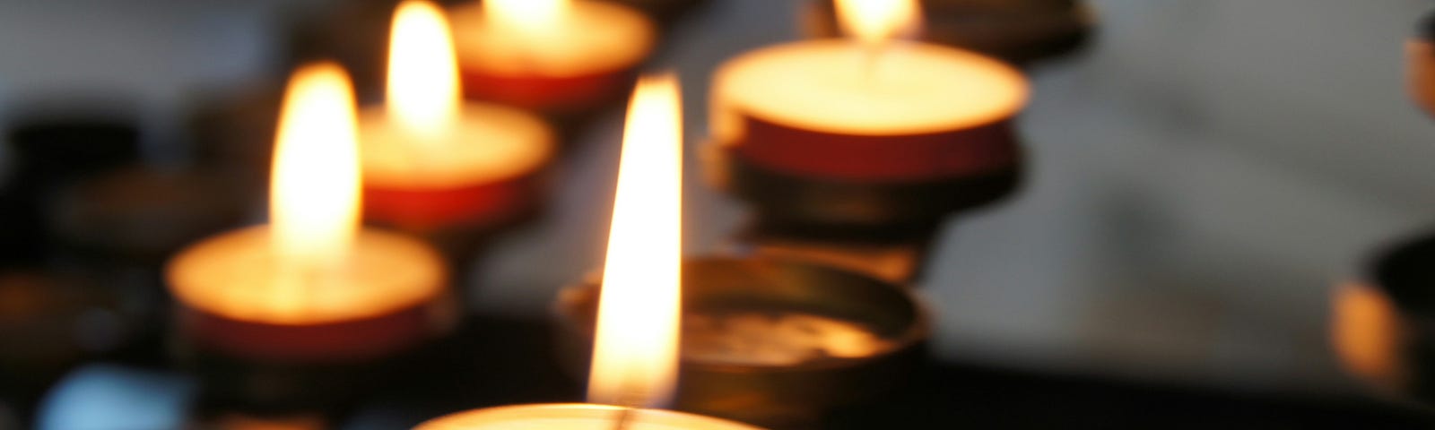 Votive candles on an alter