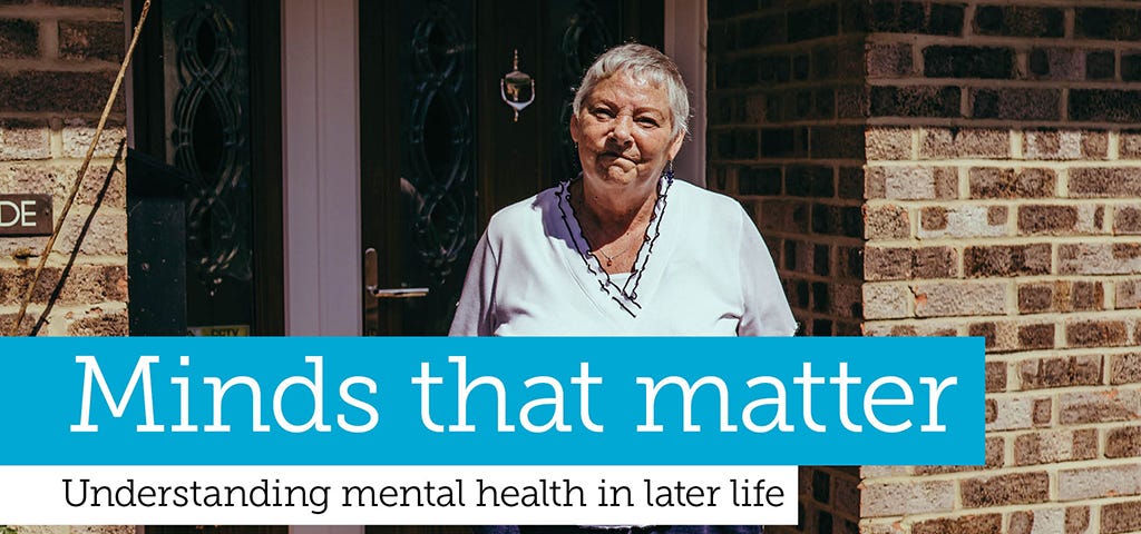 Photo of Jan, an older person we work with, standing outside her home.