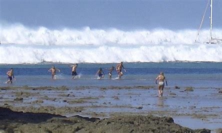 Bathers trying to escape the approaching Tsunami waves.