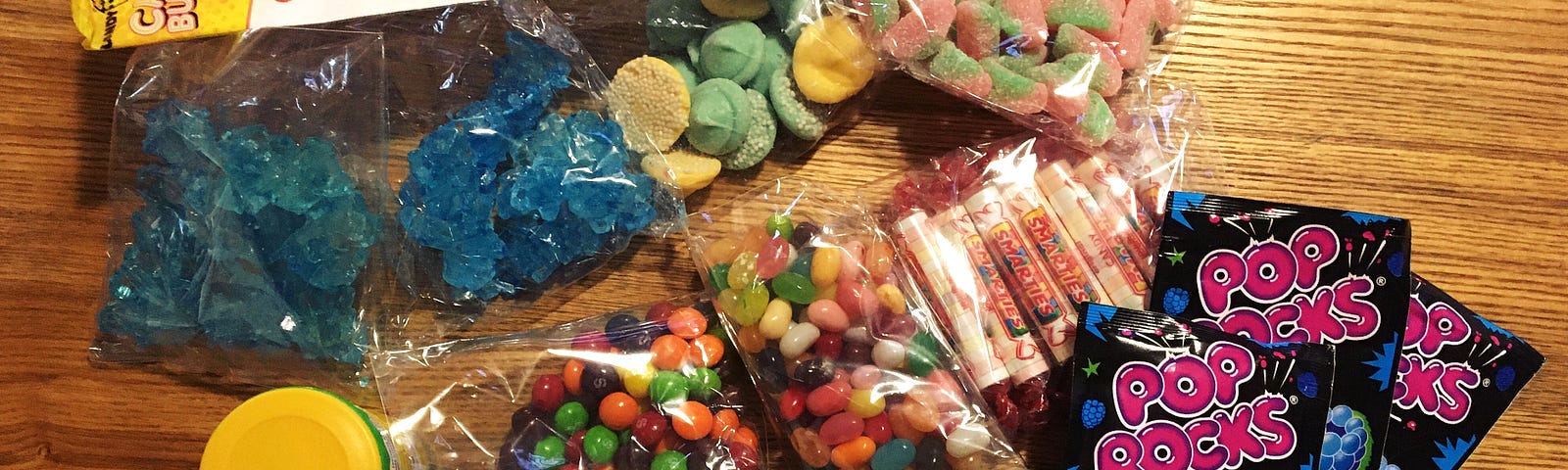 Colorful candy arrayed on a tabletop.
