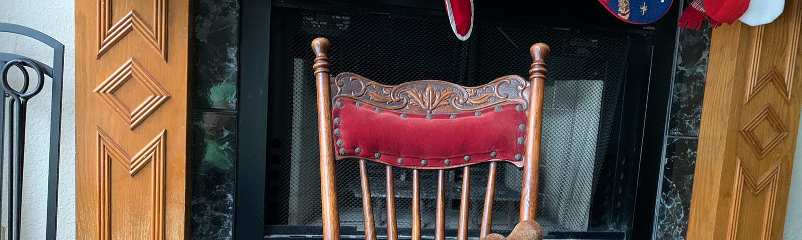 Antique rocker, rolling pin, headband and photo of woman c. 1900 in front of fireplace