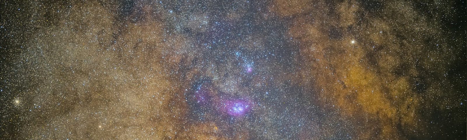 View of the sky full of stars and clouds of gas