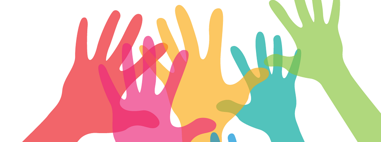 A drawing of multi-colored hands reaching upward .