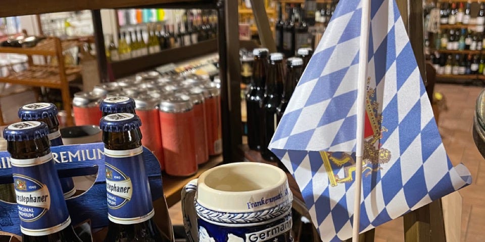 The Bavarian Flag, with Bavarian beer and stein located in a Frankenmuth store.