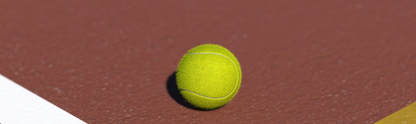 tennis ball on the court near the line