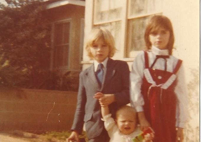 Tanya Petro as a toddler with her brother, Greg, and her sister, Tracy