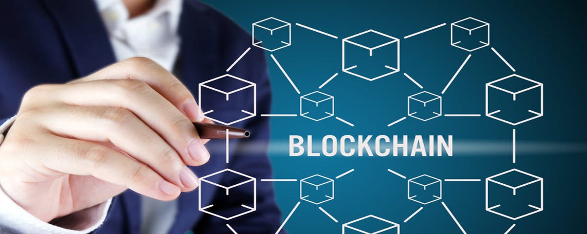 Businessman pointing at blockchain concept. Blockchain technology concept with cube and line connected.