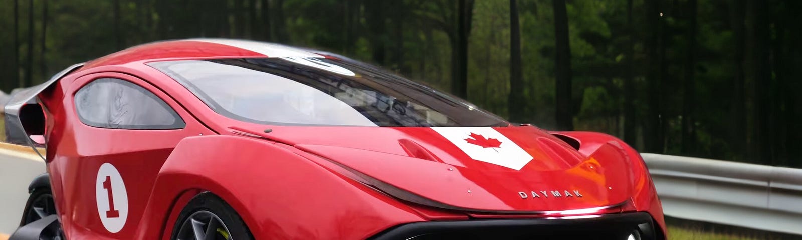 An angled view of a red AVVENIRE Spiritus all-electric three-wheeled vehicle on the open road.