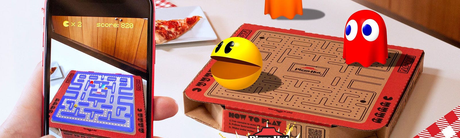A demonstration of the Pizza Hut augmented reality pizza box, featuring Pac-Man.