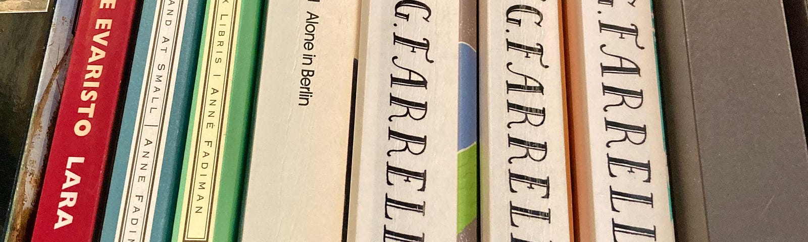 Book spines on a books shelf; three books by J. G. Farrell