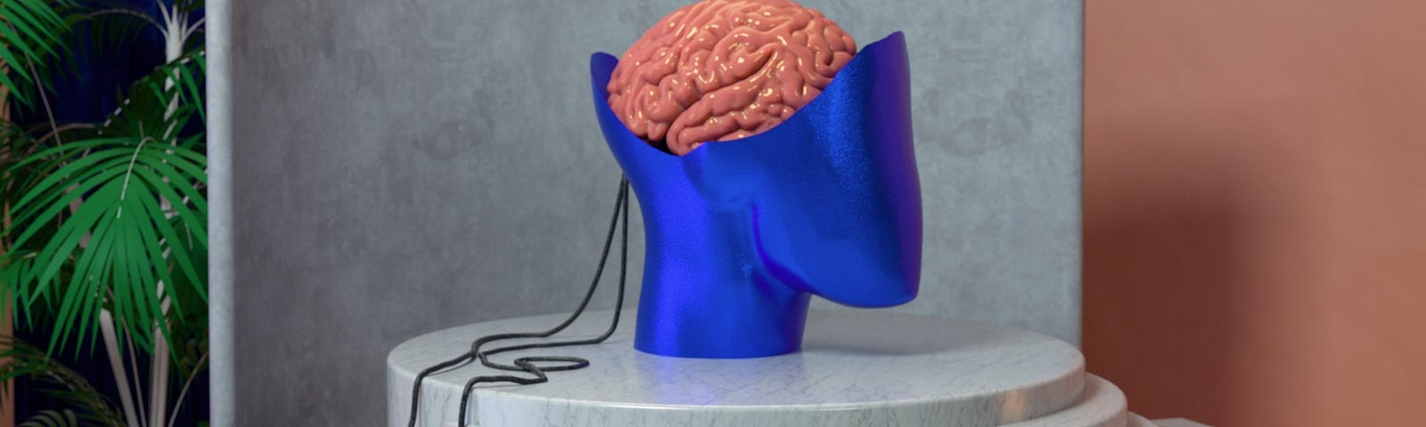 A model of a brain inside a partial head sits on top of a table and is connected by cords to two old-style video game joystick controllers.