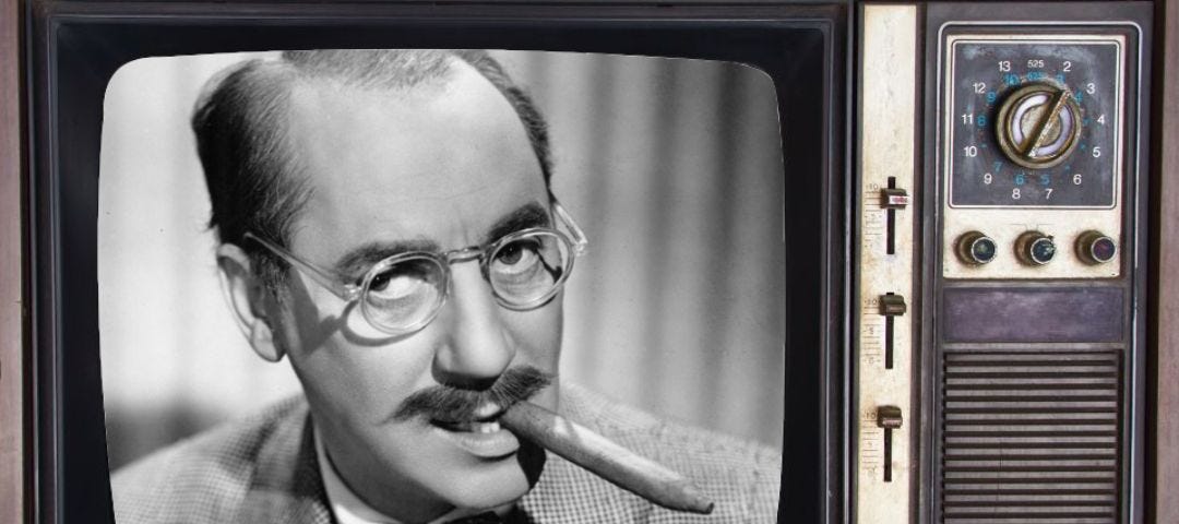 A picture of Groucho Marx in an old T.V. screen