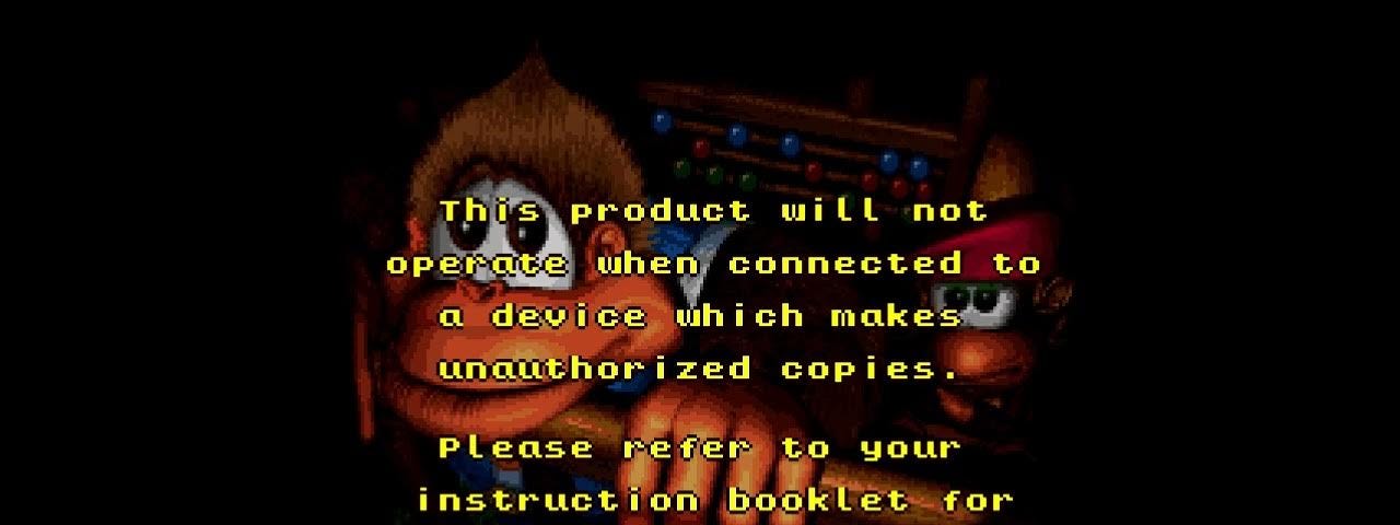 A dark image of Donkey Kong with a text overlay that reads: “This product will not operate when connected to a device which makes unauthorized copies. Please refer to your instruction booklet for further information.”