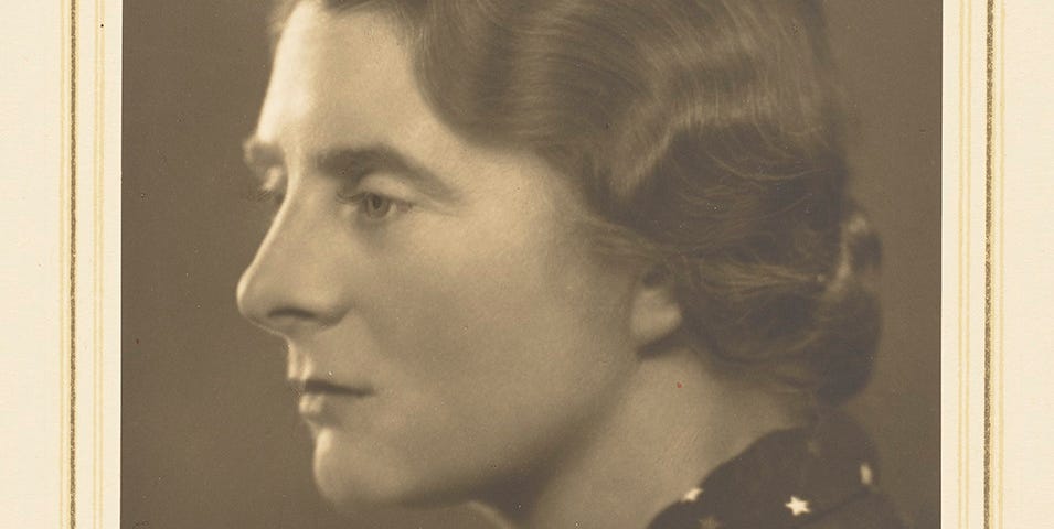 Studio portrait photograph of Margaret Pilkington in profile wearing a blouse decorated with stars, c.1930s