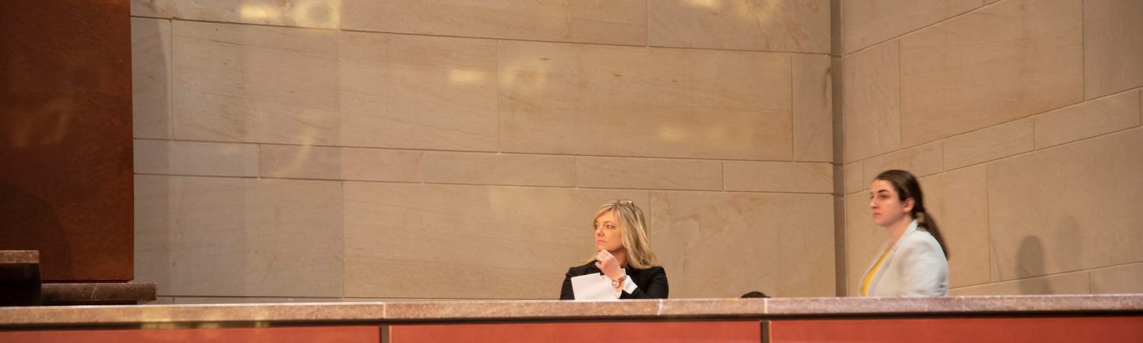 Terri Tanielian waits for a congressional hearing to begin. Photo by Grace Evans/RAND Corporation