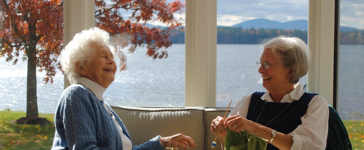 Two elderly women talking