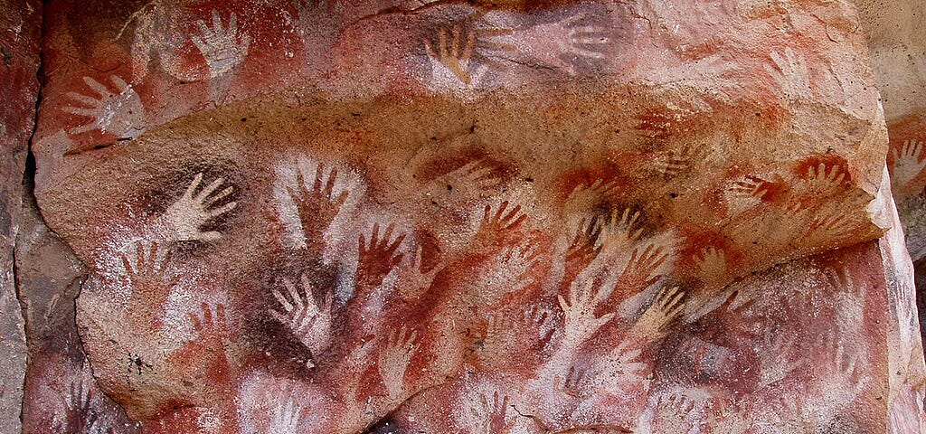 Handprints on a cave wall created over 7,000 years ago in Argentina