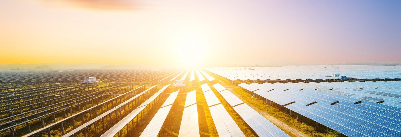 Solar panel arrays at sunset