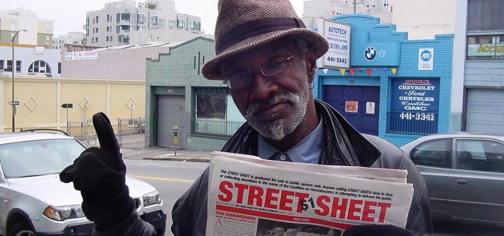 ‘Street Sheet’ newspaper sold on the streets of San Francisco, May 2009. Ron sells the Street Sheet and spreads cheer to passersby in his neighborhood.