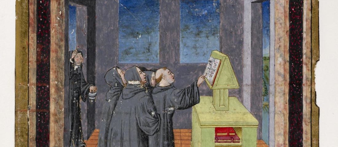 Group of monks praying, with a liturgical book.