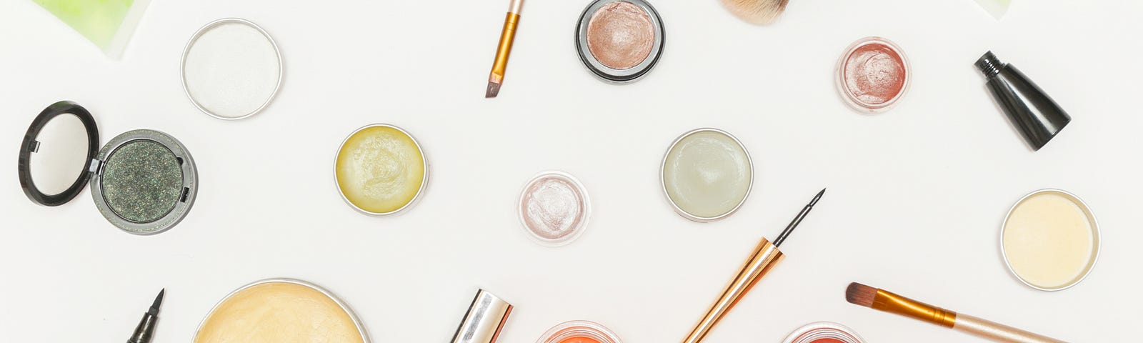 How to pack a suitcase in 10 minutes flat. Photo of cosmetics on a white background. Story by Laura Metze.