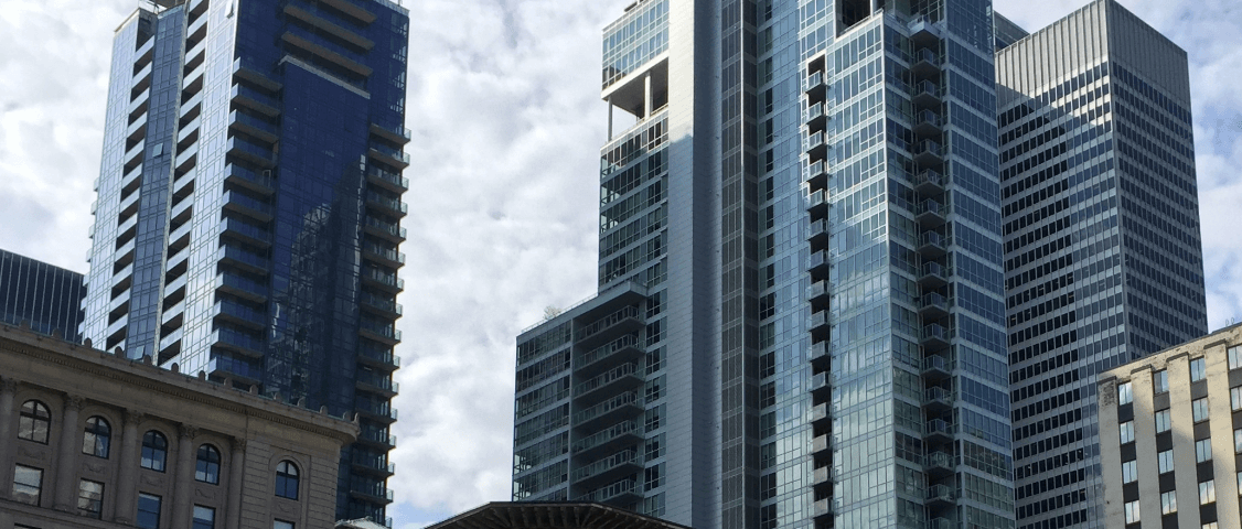 Cityscape with glass-fronted skyscrapers