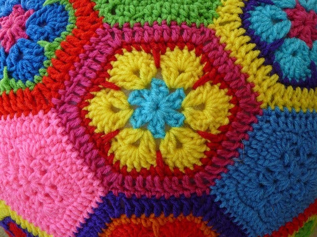 Detail of a crochet soccer ball made using the African flower crochet hexagon motif