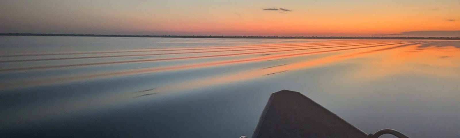 Sunrise over the Rio Negro near Tumbira, Brazil in the Amazon river basin (photo by Dave Thau)