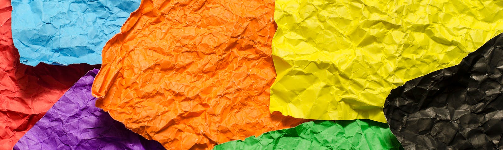 6 crumpled, blank post-it notes in different colours