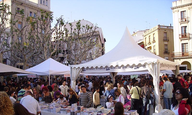 Temporary stalls selling books in a town square in Mataró, Catalonia, for World Book Day