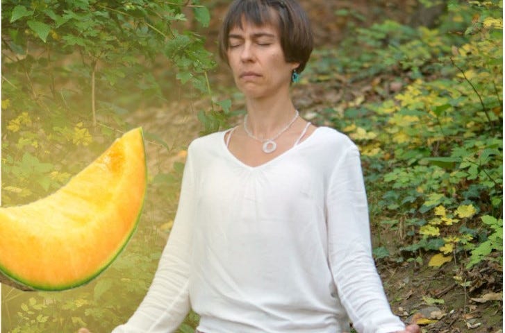 A Person Meditating in front of a holy piece of Cantaloupe.