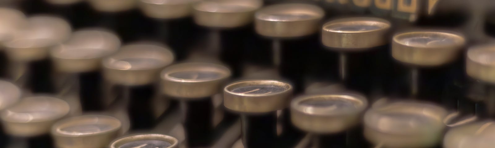 An antique typewriter close up to show the keys
