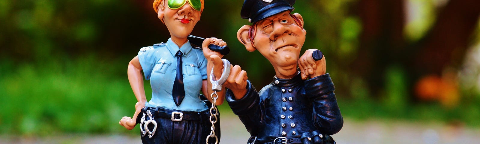 Clay figurines of police officers.