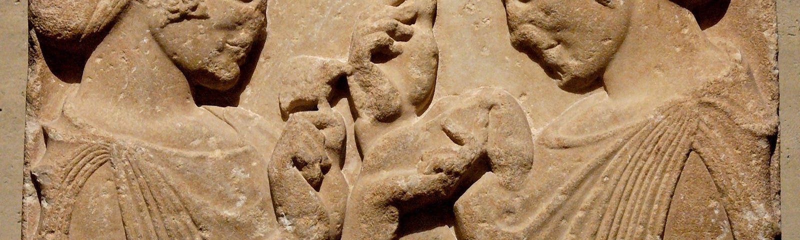 Two women carved out in stone