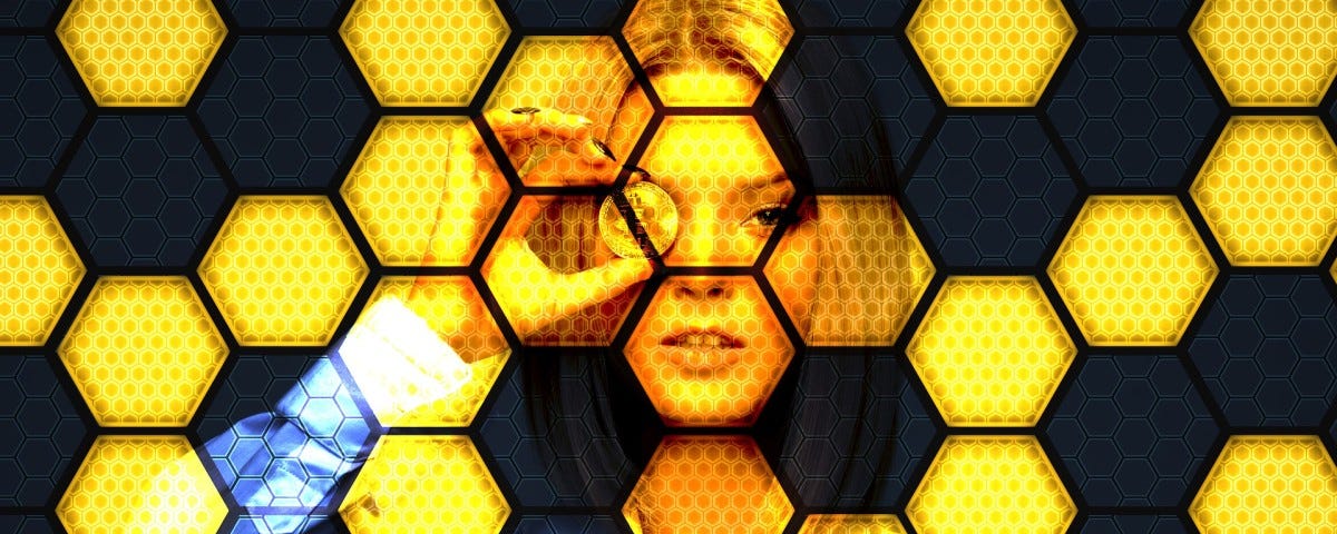 Woman holding a Gold coin on her eye. Honeycomb background picture