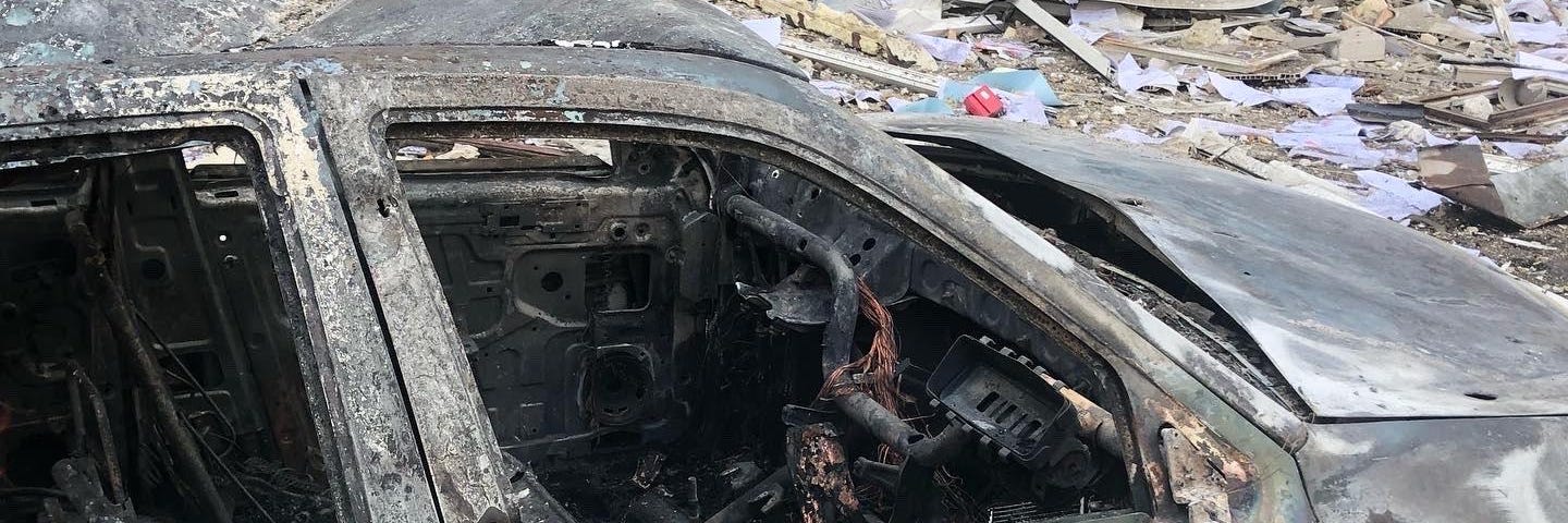 bombed car in Ukraine.