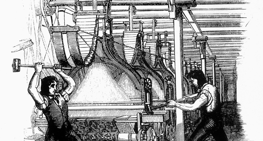 Luddites destroying a textile machine