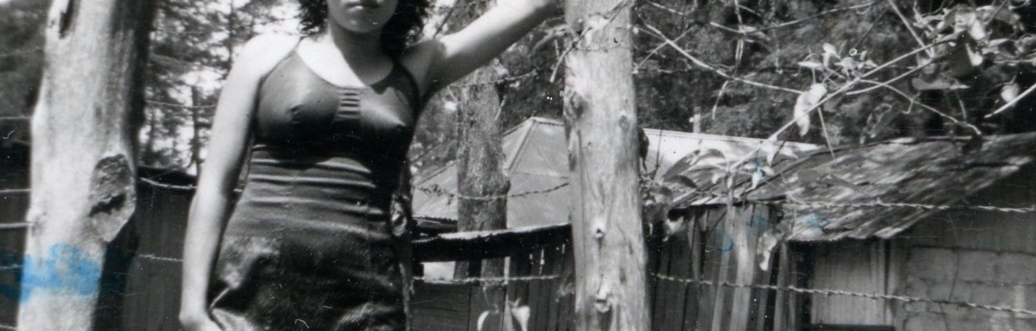 The author’s mother when she was 20 posing in a bathing suit.