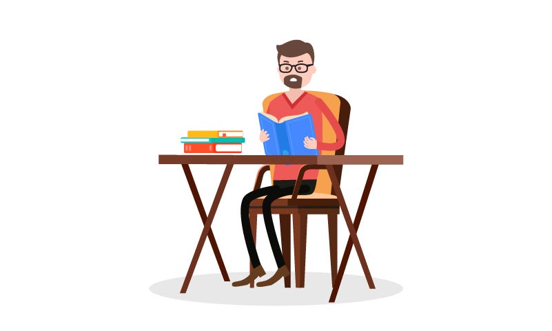 A lifelong learner sitting at the desk and reading books