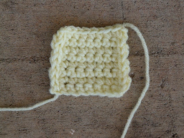 A completed crochet Bauhaus Block