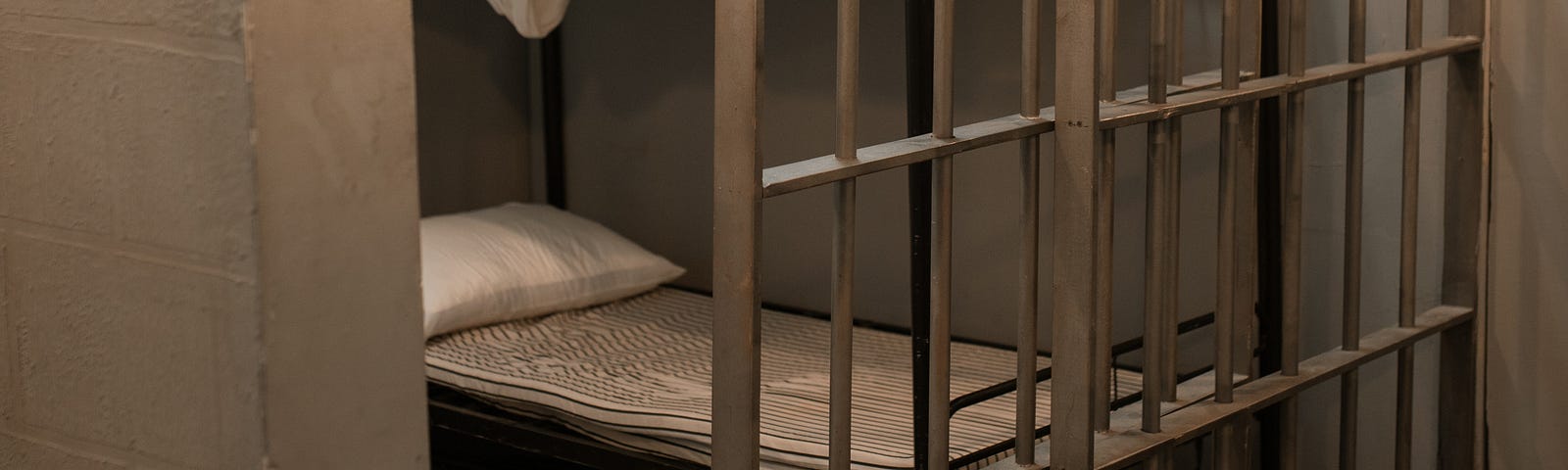 2 bunk beds inside a prison cell.