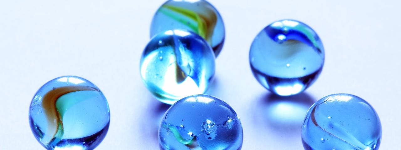 Six blue marbles
