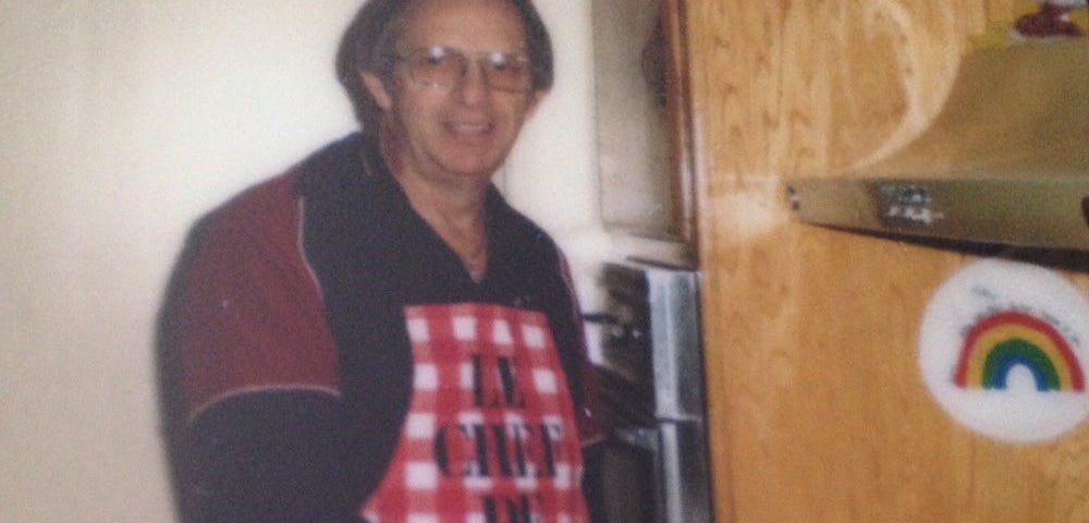 My photo of dad cooking breakfast. Photo property of author.
